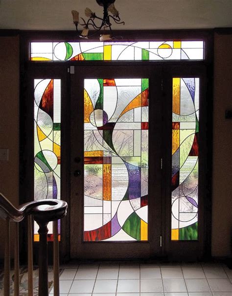 Entry Doors Are Flanked By Colorful Stained Glass Stained Glass Door Stained Glass Stained