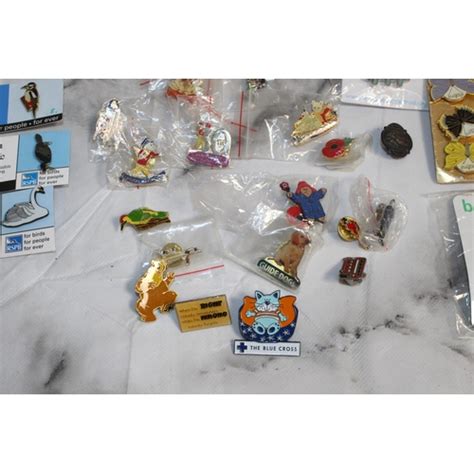 A Quantity Of Collectable Pin Badges And Other