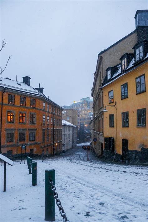 Snowy, Traditional Swedish Street at Christmas in the Evening Light ...