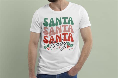 Christmas Typographic T Shirt Vector Graphic By Kamal Hosen · Creative