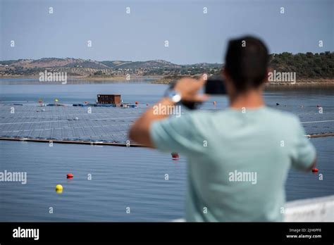 A Tourist Is Seen Taking Photos Of The Floating Solar Power Plant In