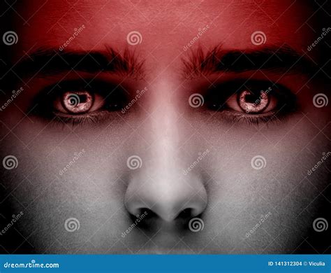 Evil Black Alien Vampire Or Zombie Eyes Close Up Shot Stock Photo