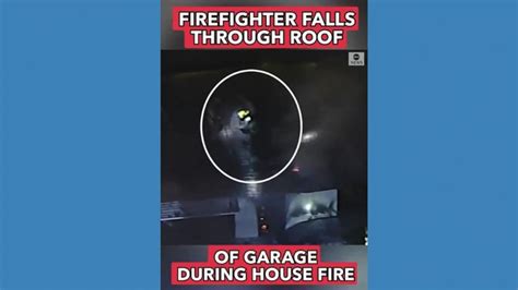 Video Firefighter Falls Through Roof Of Burning Garage Abc News