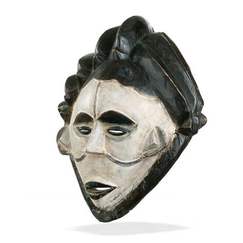 Bonhams : A collection of seven African ceremonial masks