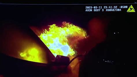 Michigan Police Officer Pulls Driver From Fiery Suv After Deadly High