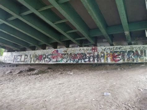 Graffiti under a bridge stock photo. Image of sunny - 111264202