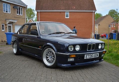 BMW E30 318i 1987 with 2.5L M50 conversion, M-Tech kit, full leather interior, and much more ...