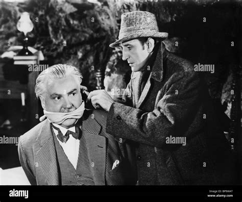 NIGEL BRUCE & BASIL RATHBONE SHERLOCK HOLMES IN WASHINGTON (1943 Stock Photo, Royalty Free Image ...