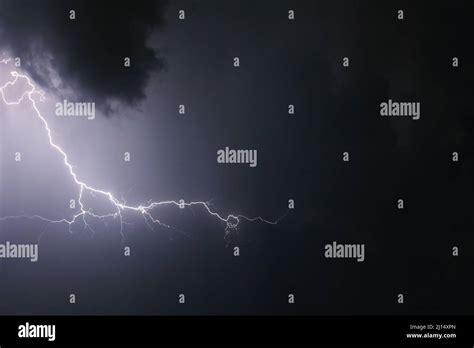 Dark ominous clouds. Thunderstorm with lightning Stock Photo - Alamy