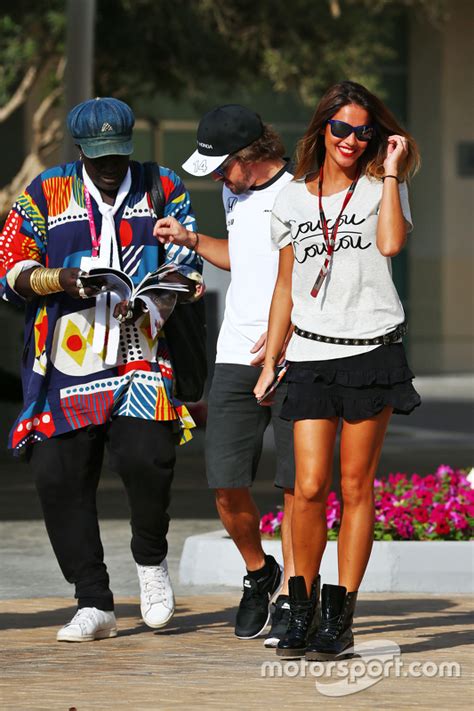 Fernando Alonso Mclaren With His Girlfriend Lara Alvarez And Mr Moko