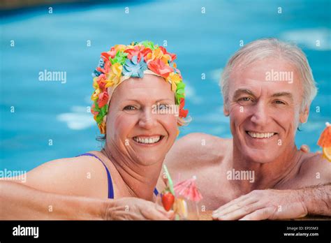 Happy Mature Couple In The Swimming Pool Stock Photo Alamy