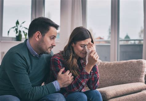 Man Hugging Sad Girlfriend at Home Stock Image - Image of girlfriend ...