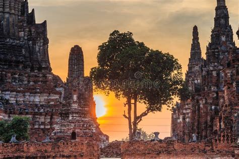 An Ancient Ruin of Wat Chaiwatthanaram with the Sunset Stock Image ...