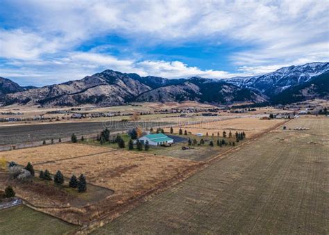 beautiful montana landscape open grassland fences dirt road