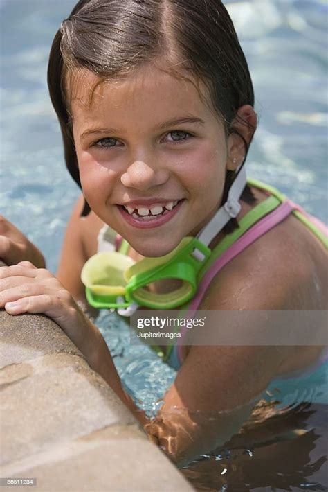 Portrait Of Smiling Girl In Swimming Pool High Res Stock Photo Getty