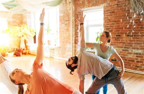 Group of People Doing Yoga Exercises at Studio Stock Photo - Image of ...