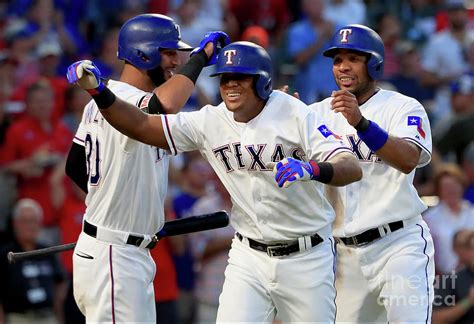 Adrian Beltre, Elvis Andrus, and Nomar Mazara by Tom Pennington