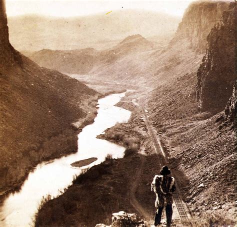 A Native American Looks Down Upon A Newly Completed Section Of The