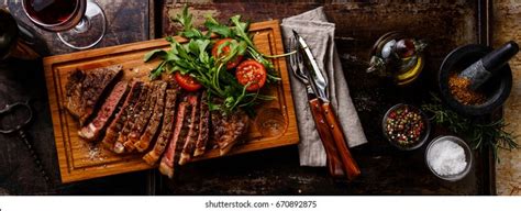 Sliced Grilled Beef Barbecue Striploin Steak Stock Photo 670892875