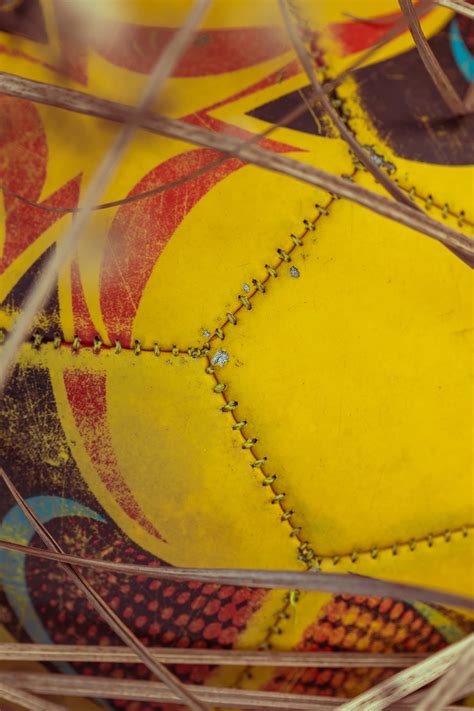 Free picture: Close-up of orange yellow Nike soccer ball in network