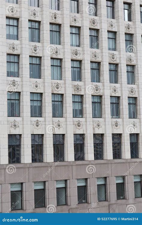 A Stone Cladding Facade In Grey And Dark Grey Colour With Repetitive