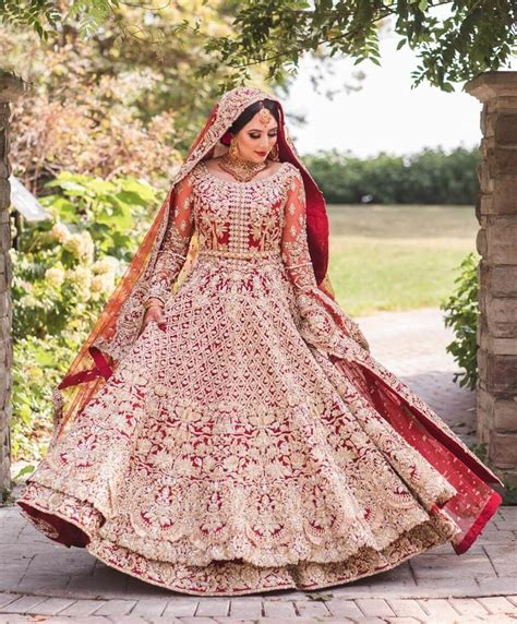 A Captivating Vision Red Heavy Embellished Net Anarkali Muslim Wedding