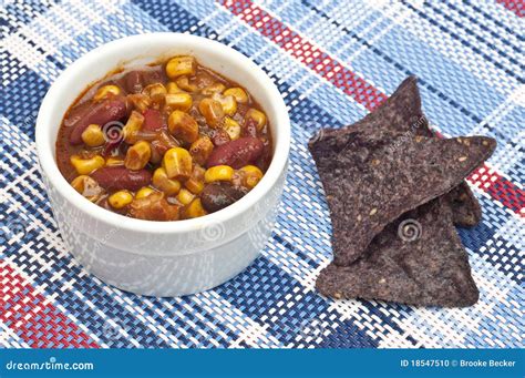 Black Bean Dip with Blue Corn Tortilla Chips Stock Photo - Image of ...