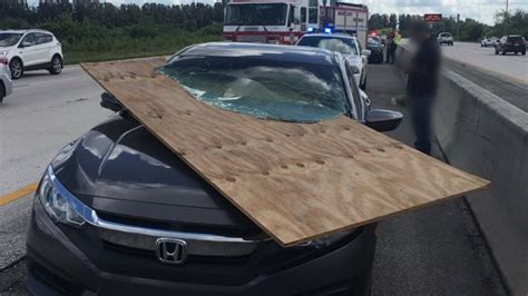 Florida Driver Nearly Impaled By Plywood As It Smashes Through