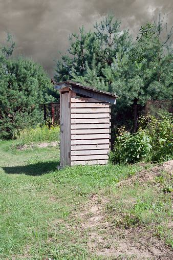 Vintage Toilet An Outdoor Rustic Green Toilet With A Heart Cut Out On