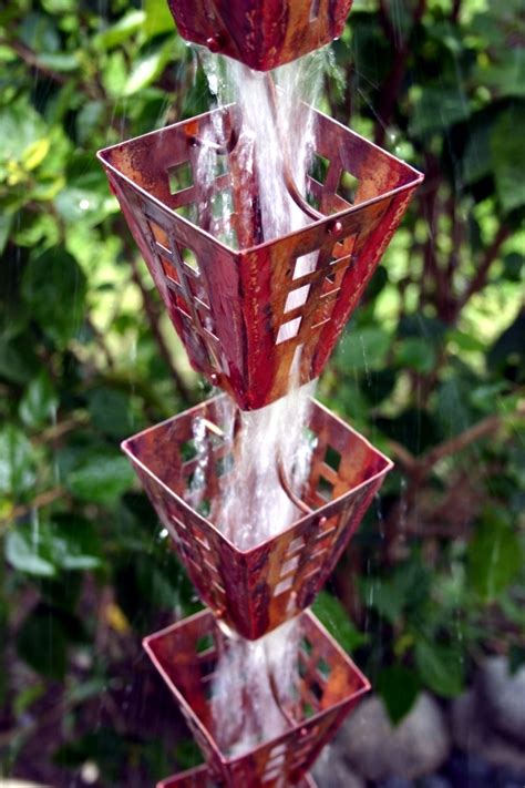 The rain chain downspout instead serves as a creative decoration in the ...