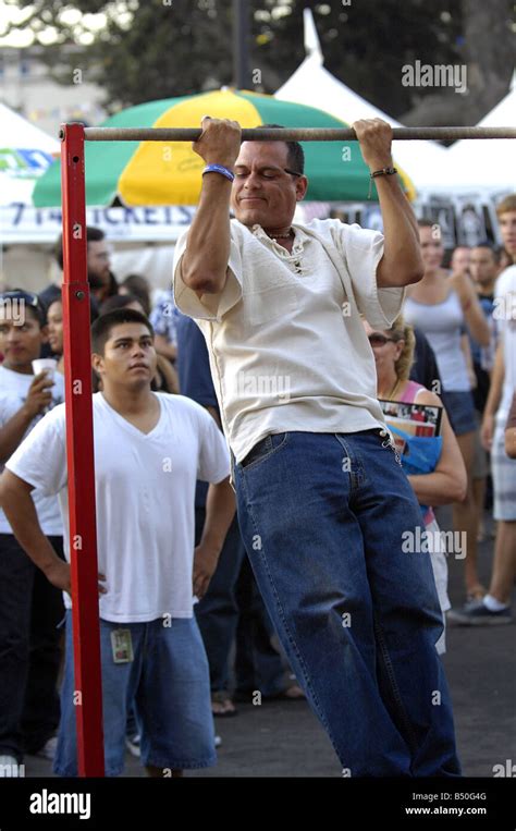 Visitors To A Us Marine Corps Recruiting Booth At A Street Fair