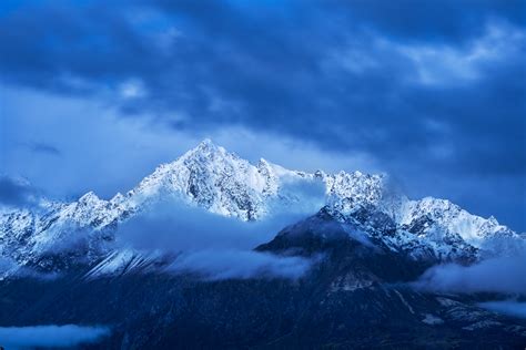 Alaska snow-covered mountain in blue hour fine art photo | Photos by Joseph C. Filer