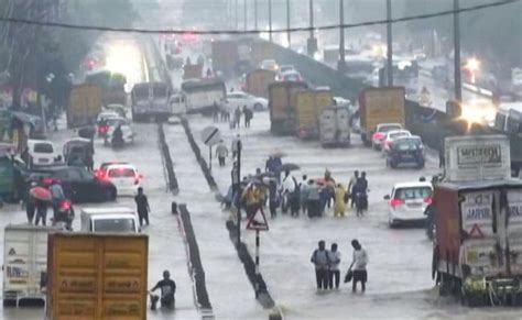 Video People Walk On Flooded Delhi Gurugram Expressway Amid Heavy Rain