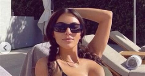 Kim Kardashian Flaunts Cleavage In Tiny String Bikini As Ex Kanye Cuts Her Off Daily Star