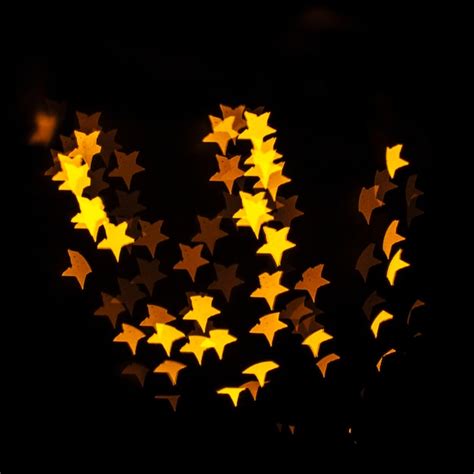 Yellow star-shaped lights Photo | Free Download