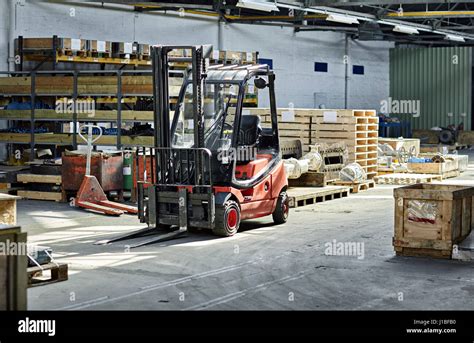 Forklift Truck In Warehouse Standing Still Colour Landscape Stock