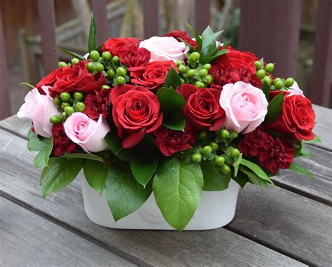 Valentine's Day flower arrangement with roses, hypericum berry and ...