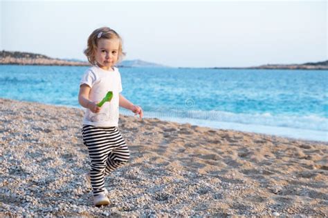 Blue Beach Kid Girl With Bikini Jumping And Running Stock Image Image