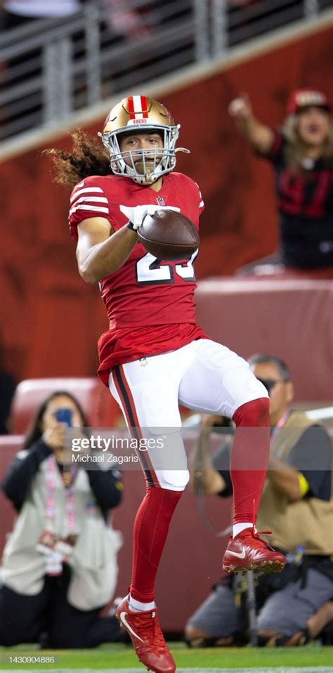 Talanoa Hufanga of the San Francisco 49ers celebrates after returning ...