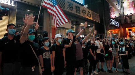 Hong Kong Protesters Defy Mask Ban In New Round Of Demonstrations As