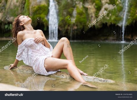 River Half Naked Woman Sitting By Stone Stock Photo Shutterstock