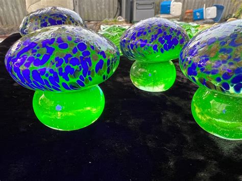 uranium glass mushrooms figurine blue  gold etsy