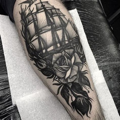 Engraving Style Black Ink Leg Tattoo Of Sailing Ship With Rose Tattooimages