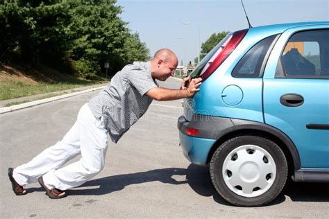 Man pushing a car stock photo. Image of help, engine, mechanics - 3226214