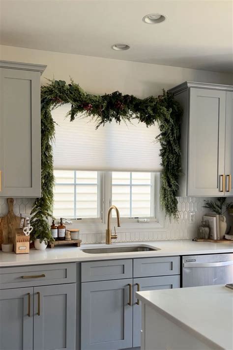 Kitchen With Christmas Garland Above Sink