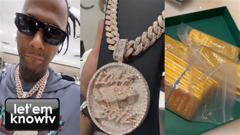 Moneybagg Yo Shows Off Several Bundles Of Cash Bars Of Gold And A New