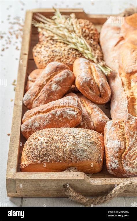 Rustic Baguettes And Buns Baked In Bakery Made Of Wheat And Rye