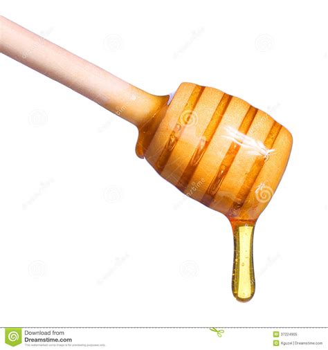 Honey Dripping From Wooden Honey Dipper Isolated On White Stock Image