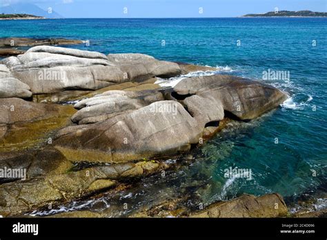 Beautiful Seascape With Stones And Translucent Blue Water Stock Photo