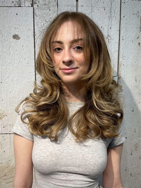 This hair tutorial explains how a long layered cut is done 2